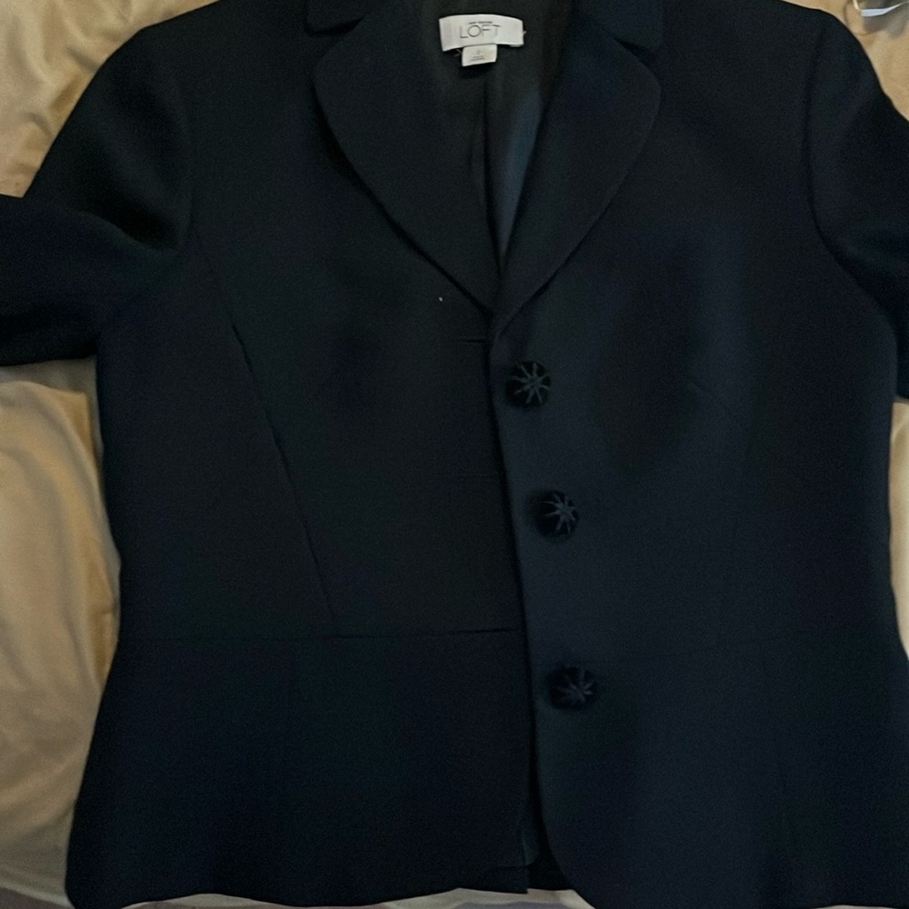Black Ann Taylor skirt suit.  Size 2 jacket, size 8 skirt…sold together.